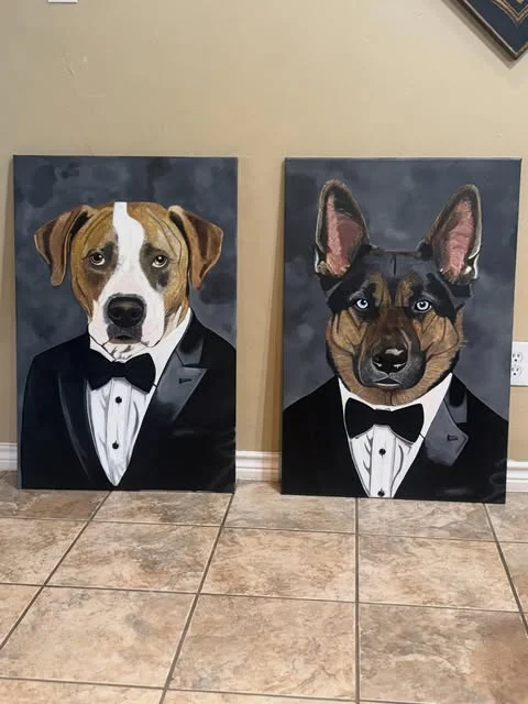 Two dogs painted in tuxedos, side by side canvases